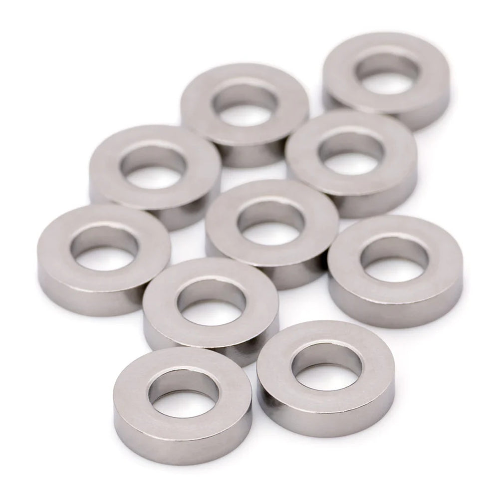 Set of metallic washers on a white background