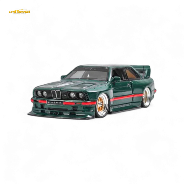 Model car of a green BMW on a white background