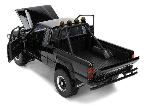 1985 Toyota SR5 Pickup Truck Black with Marty's Skateboard "Back to the Future" (1985) Movie "Hollywood Rides" Series 1/24 Diecast Model Car by Jada