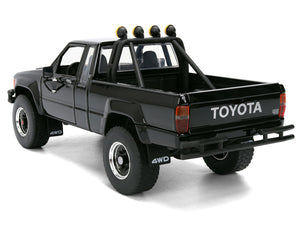 1985 Toyota SR5 Pickup Truck Black with Marty's Skateboard "Back to the Future" (1985) Movie "Hollywood Rides" Series 1/24 Diecast Model Car by Jada