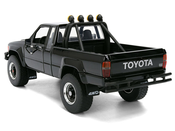 1985 Toyota SR5 Pickup Truck Black with Marty's Skateboard "Back to the Future" (1985) Movie "Hollywood Rides" Series 1/24 Diecast Model Car by Jada
