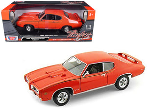 1969 Pontiac GTO Judge Orange 1/18 Diecast Model Car by Motormax — physical