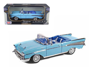 1957 Chevrolet Bel Air Convertible Light Blue with Blue Interior 1/18 Diecast Model Car by Motormax — physical