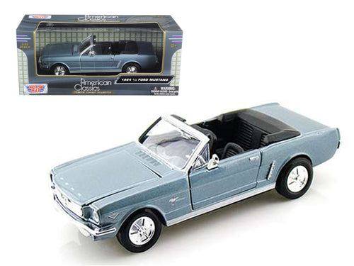 1964 1/2 Ford Mustang Convertible Light Blue 1/24 Diecast Model Car by Motormax — physical