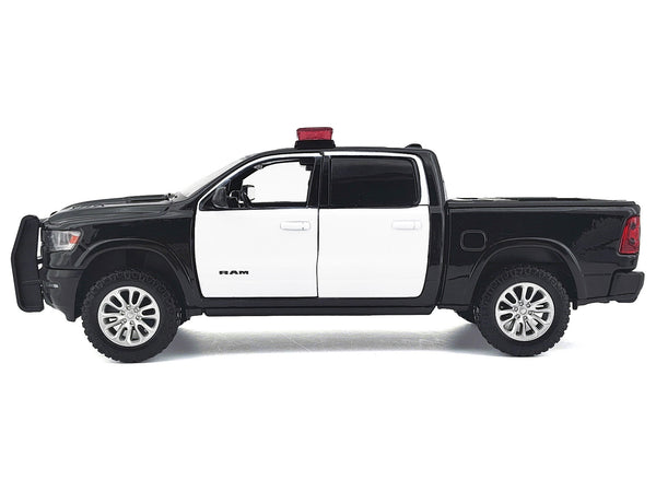 2019 RAM 1500 Laramie Crew Cab Pickup Truck Black and White with Flashing Light Bar and Front and Rear Lights and Sounds 1/27 Diecast Model Car by Motormax