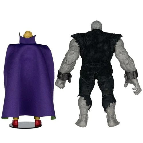 Two action figures, one with a purple cape and crown, the other in black attire, on a white background.