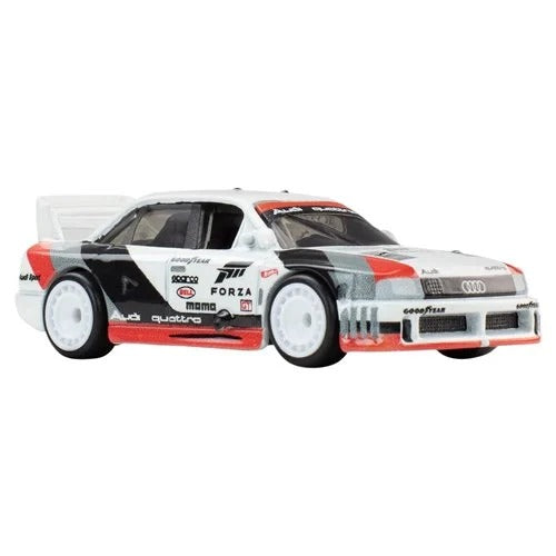 Hot Wheels Pop Culture 2026 - Select Vehicle(s) featuring a detailed white, red, and black Audi Quattro diecast car with racing decals, reflecting a veteran-owned, STEM-focused hobby brand.