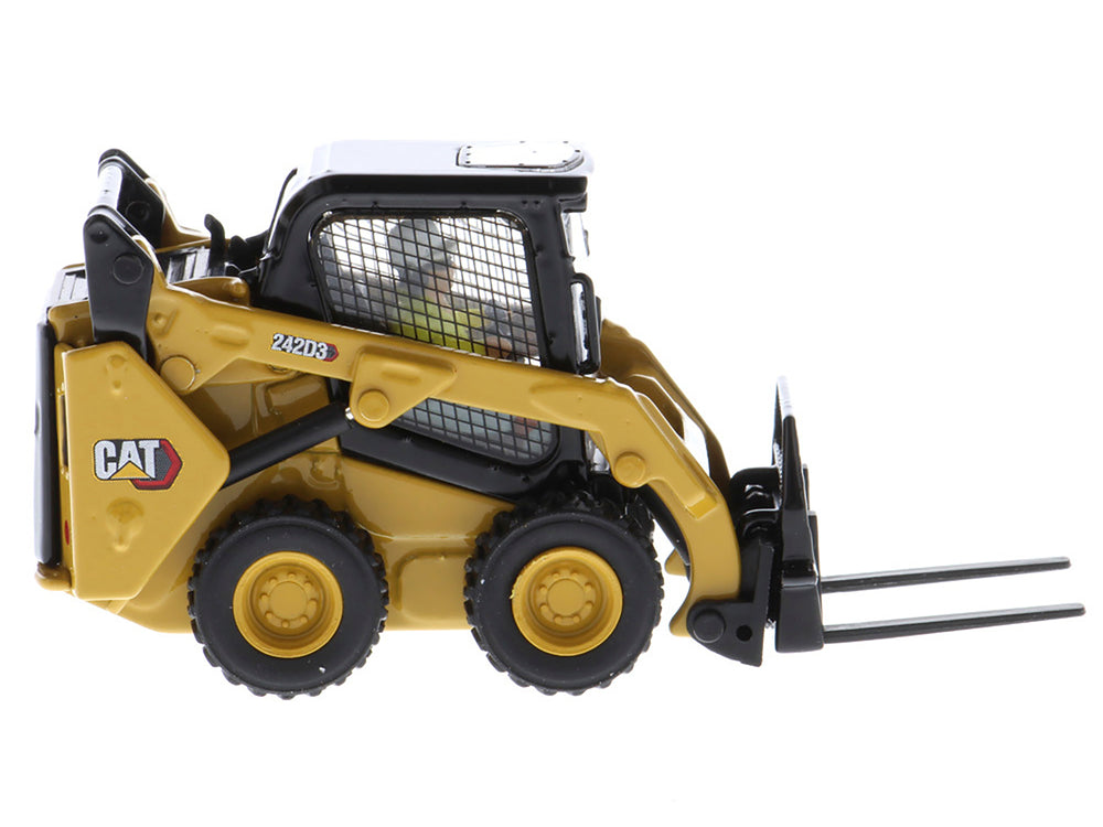 CAT Caterpillar 242D3 Wheeled Skid Steer Loader with Work Tools and Operator Yellow "High Line Series" 1/50 Diecast Model by Diecast Masters — Echo Six Hobbies, view 1