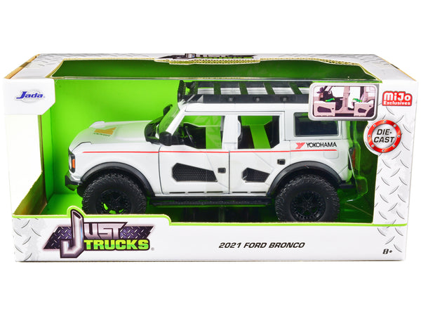 2021 Ford Bronco White with Red Stripes and Roof Rack "Yokohama Tires" "Just Trucks" Series 1/24 Diecast Model Car by Jada — Echo Six Hobbies, view 1