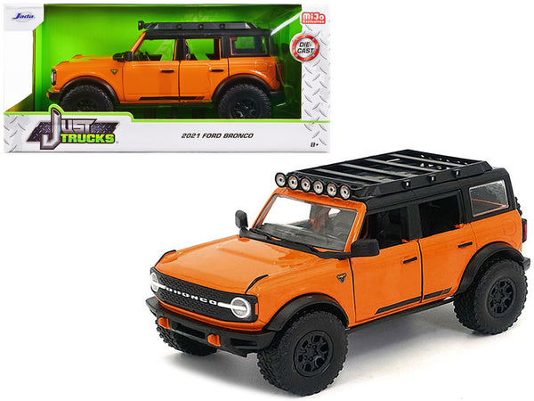 2021 Ford Bronco Orange with Black Stripes and Roof Rack "Just Trucks" Series 1/24 Diecast Model Car by Jada — Echo Six Hobbies, view 1