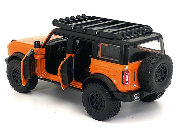 2021 Ford Bronco Orange with Black Stripes and Roof Rack "Just Trucks" Series 1/24 Diecast Model Car by Jada — Echo Six Hobbies, view 2