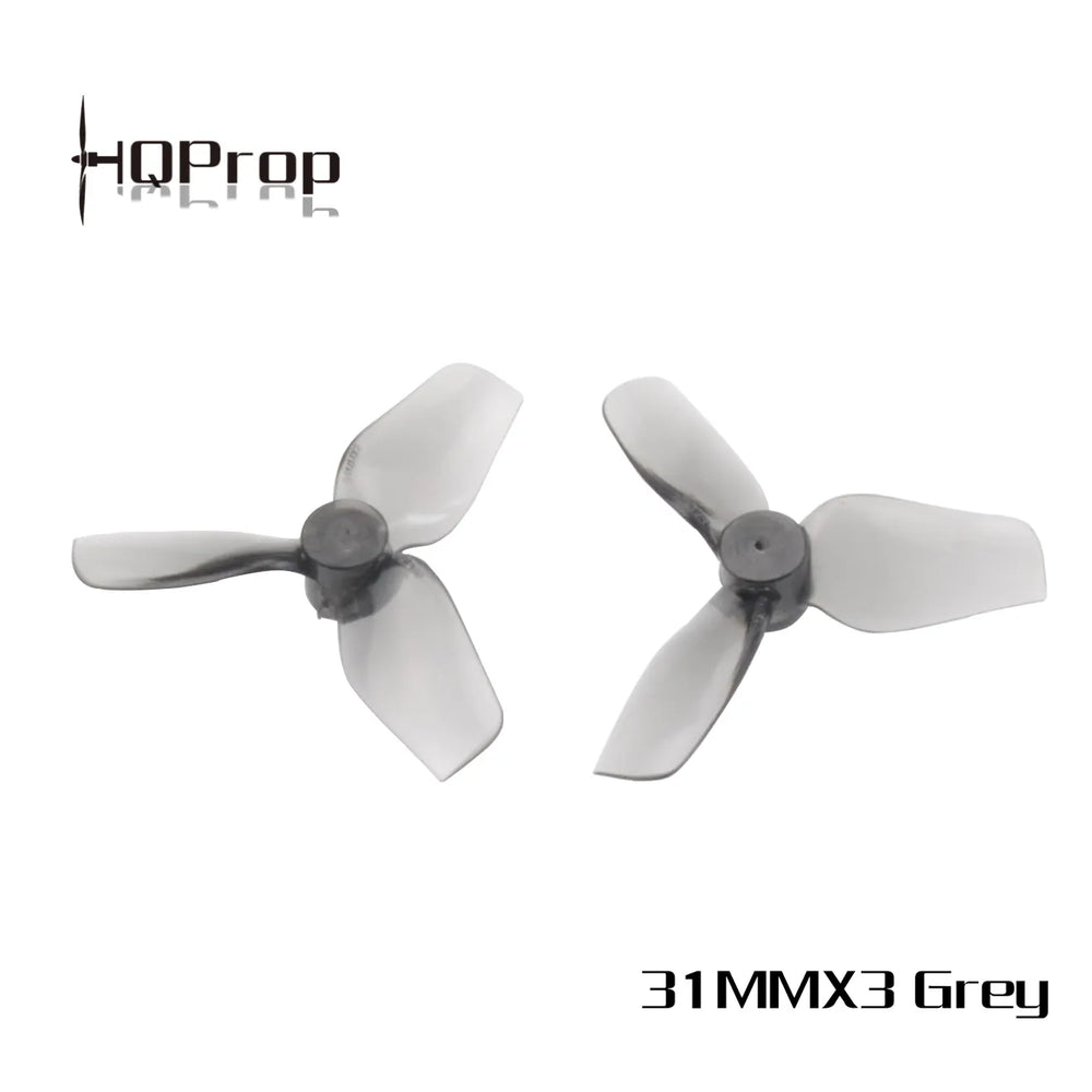 Two sets of white and blue propellers with 'HQProp' branding on a white background.