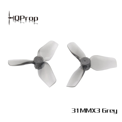 Two grey 3-blade drone propellers shown on a white background with the HQProp logo in the top-left and '31MMX3 Grey' text in the bottom-right.