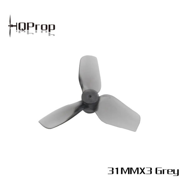 A three-blade grey plastic drone propeller on a white background, with the HQProp logo in the top-left corner and the text '31MMX3 Grey' in the bottom-right corner.