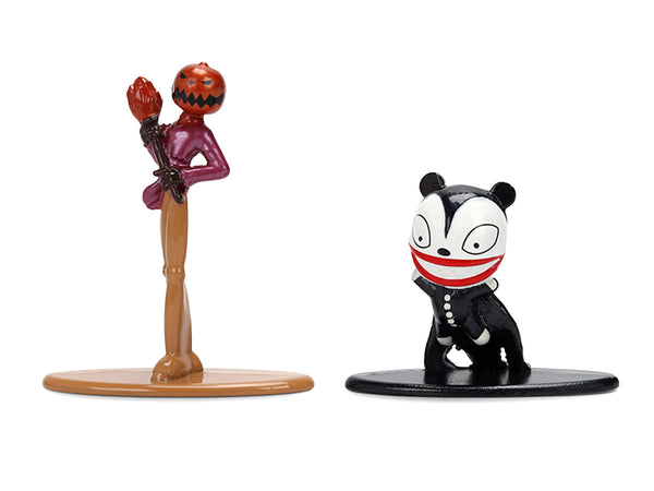 Echo Six Hobbies Two small collectible figurines on a plain white background: a standing character with a pumpkin head and purple body on a tan base, and a seated black-and-white character with a red mouth and black outfit on a black base.