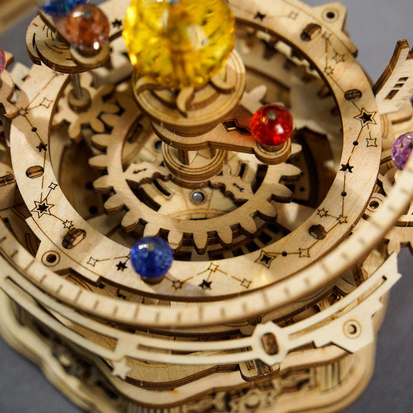Echo Six Hobbies ROKR Starry Night Orrery mechanical music box displayed on a shelf