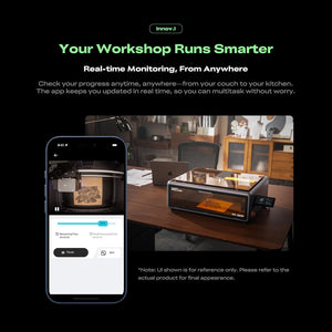 Echo Six Hobbies Smartphone app showing live laser engraving progress next to a Falcon A1 Pro engraver on a wooden desk in a workshop