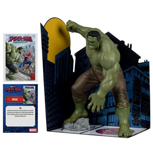 Marvel Avengers Hulk action figure posed in a dynamic crouching stance inside a cityscape display stand, with Spider-Man and Hulk cards shown to the left on a white background.