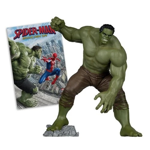 Marvel's The Incredible Hulk action figure posed dynamically on a gray rocky base, with the Spider-Man: Brand New York comic book standing behind him against a plain white background.