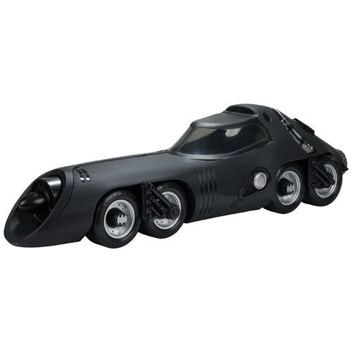 Black toy Batmobile on a white background