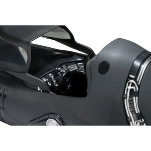 Close-up of a black motorcycle helmet with reflective visor on a white background