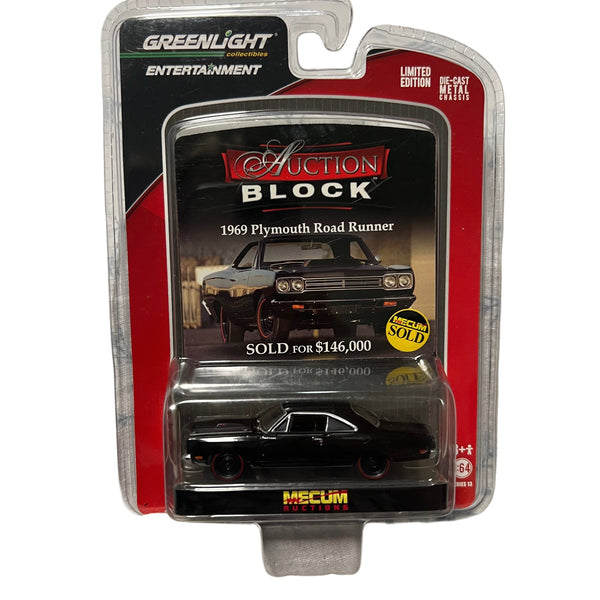 Model car in packaging with 'Greenlight' and 'Auction Block' branding.
