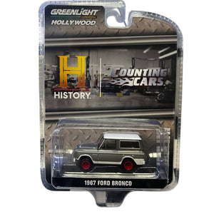 1967 Ford Bronco model car in packaging with 'Greenlight Hollywood' and 'Counting Cars' branding.