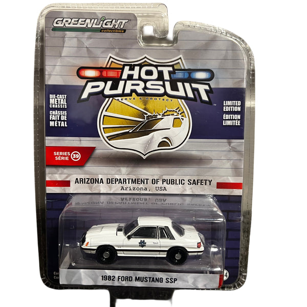 Model car in packaging with 'Hot Pursuit' branding