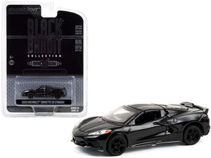 Black Chevrolet Corvette car on a white background with packaging labeled 'Black Bandit Collection'.