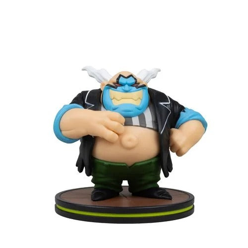 A stylized collectible figurine of a cartoon character with a blue face, black jacket, green pants, and white hair, standing on a round display base against a plain white background.
