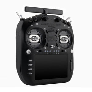 Black radio controller with antennas on a white background
