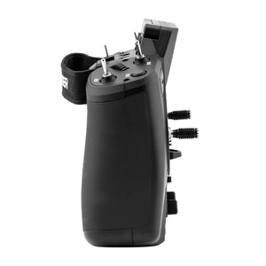 A black handheld remote control transmitter with dual joysticks, buttons, and a wrist strap, shown from a side profile view on a white background.