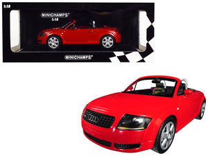 Red Audi convertible model car with Minichamps packaging