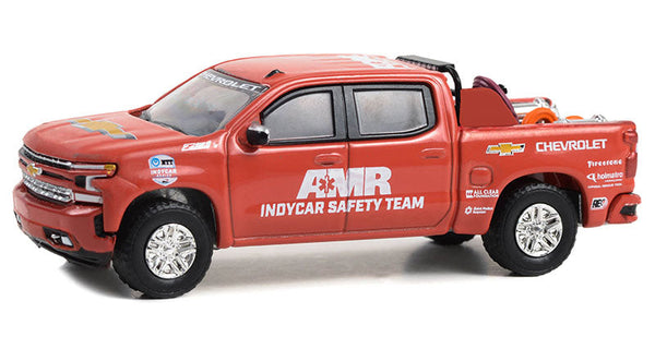 Red Chevrolet truck model with AMR IndyCar Safety Team branding on a white background