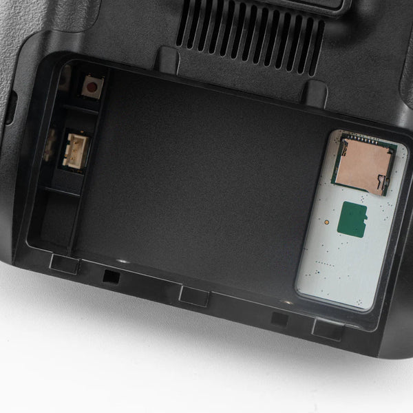 Close-up of a computer case with internal components on a white background