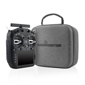 Black remote control with 'Radiomaster' branding next to a gray carrying case on a white background