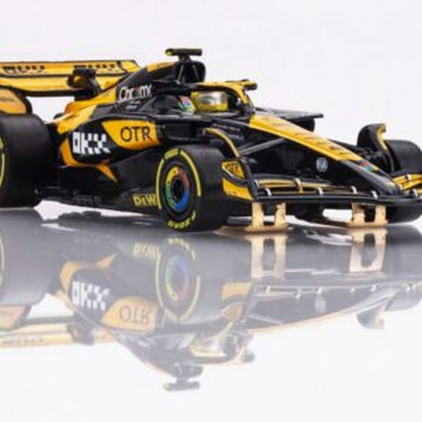 Echo Six Hobbies AFX 22103 Yellow and black Formula 1 car on a reflective surface with a white background