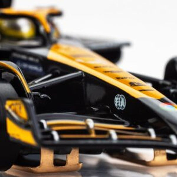 Echo Six Hobbies AFX 22103 Close-up of a Formula 1 car with prominent yellow and black colors.