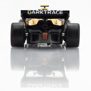 Echo Six Hobbies AFX 22103 Black and gold toy car with 'Darktrace' branding on a reflective surface.