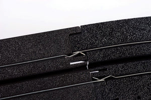 Echo Six Hobbies AFX Racing Close-up of a black foam roller with textured surface on a white background