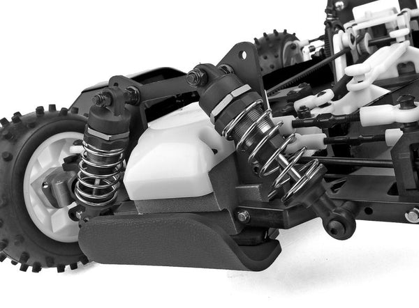 Close-up of a mechanical model with suspension and wheel components on a white background
