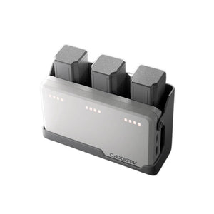 A portable power bank in gray and black, shown with three battery modules inserted into its top slots. The front features LED battery percentage indicators and the brand name 'CADDXEPV' printed near the bottom right.