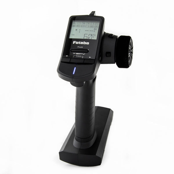 Black remote control device with digital display on a white background