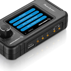 Black handheld device with digital display on a white background