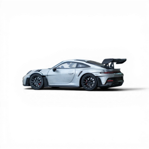 Silver Porsche on a black background