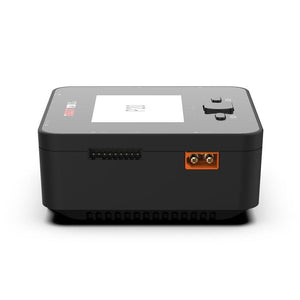 Black electronic device with ports on a white background