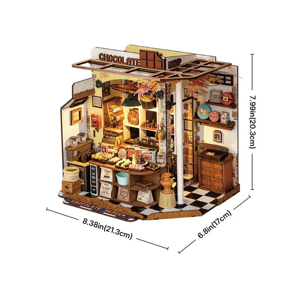 Model of a chocolate shop with dimensions indicated on a white background