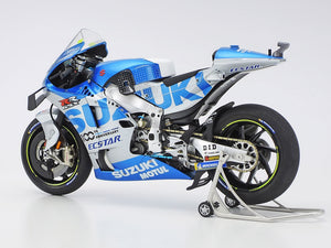 Model motorcycle on a stand with visible branding on a white background