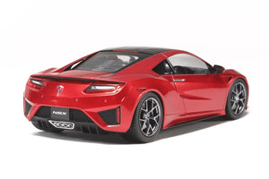 Red Honda NSX sports car on a white background