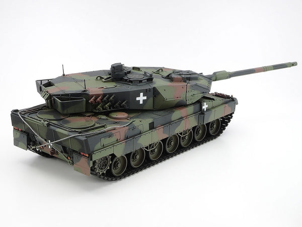Camouflage tank model on a white background